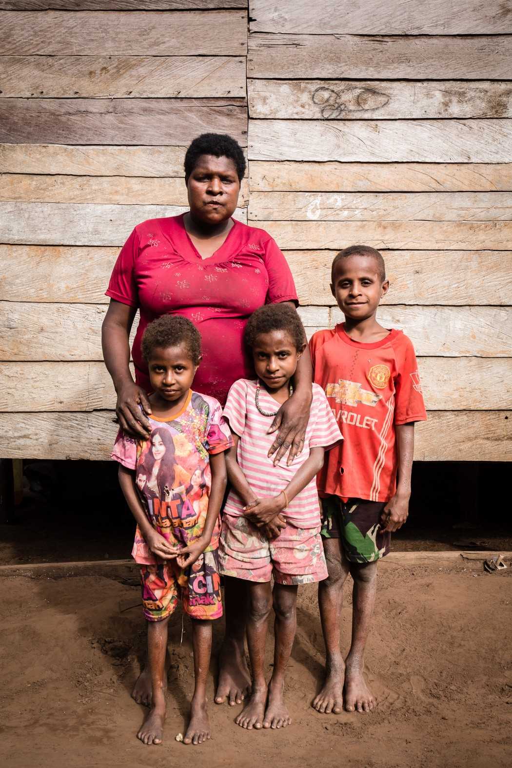 Angelina Gebze, 26, with her children in Kindiki village, Merauke district. 