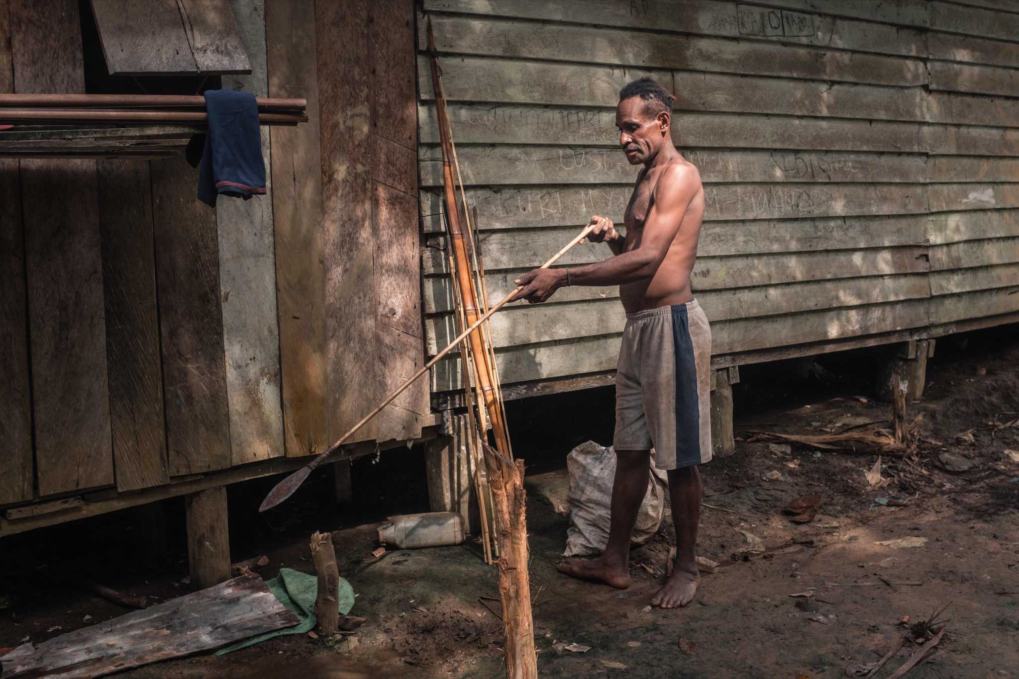 Photo of a Marind man in Zanegi, Merauke. 